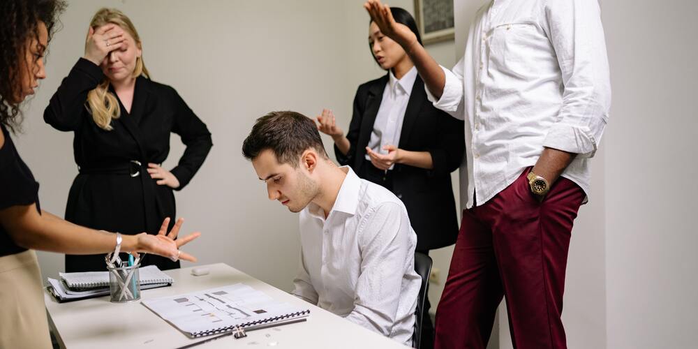 employee being blamed and feeling stressed